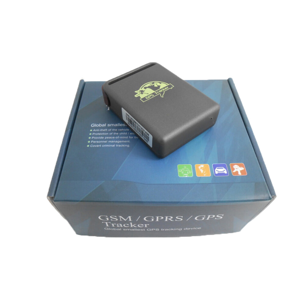 Black TK102B GPS Tracker in box, shown on top of GSM/GPRS/GPS Tracker packaging