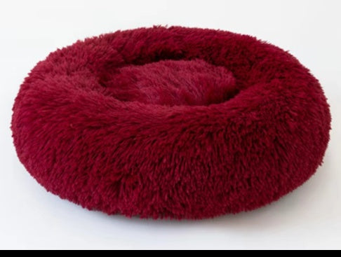 Burgundy fluffy round pet bed cushion with hollow center