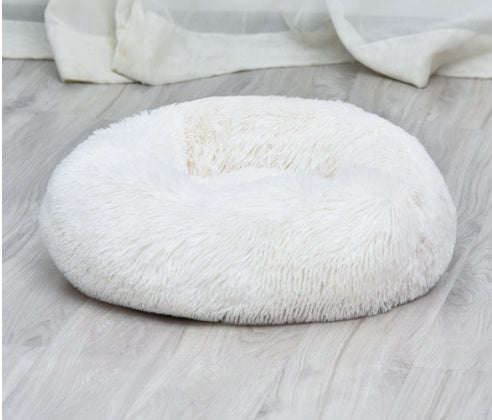 White fluffy round pet bed cushion with hollow center