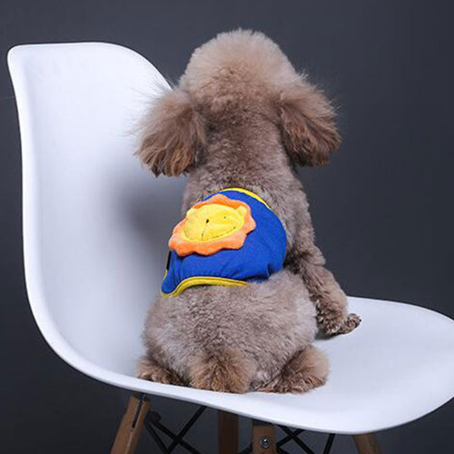 Lion-pattern anti-harassment safety pants on a small dog, blue with yellow lion applique