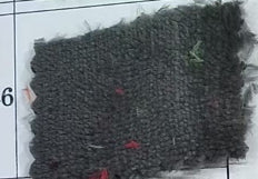 Flannel pet blanket swatch, dark gray fuzzy texture