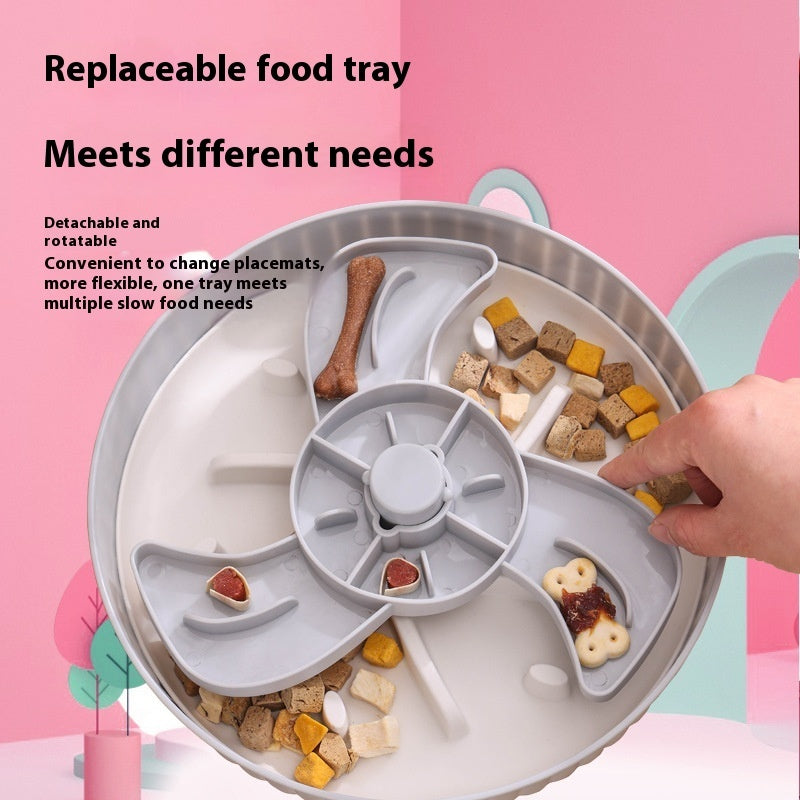 Rotatable replaceable food tray with white base and gray slow-feeding channels