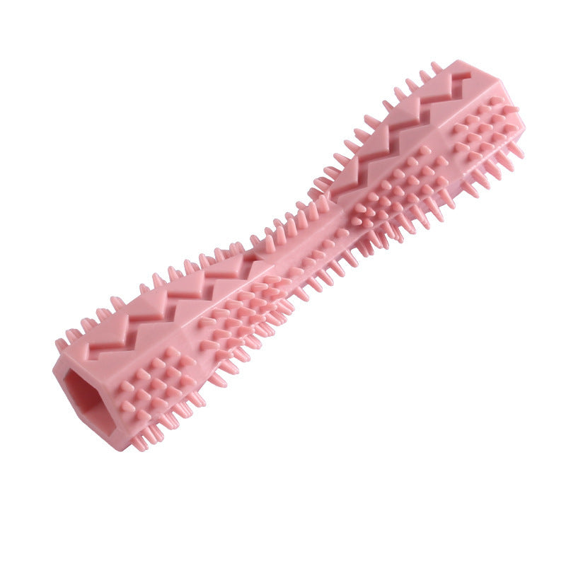 Pink dog chew toy with ridged spine and small bristle studs