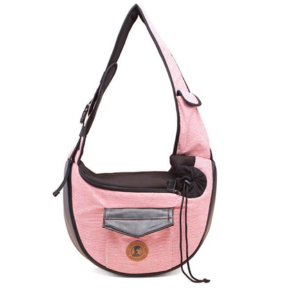 Pink striped pet travel bag with padded handle, bow tie detail, drawstring closure