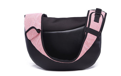 Pink Pet travel bag: black back with pink-striped trim and buckle shoulder strap