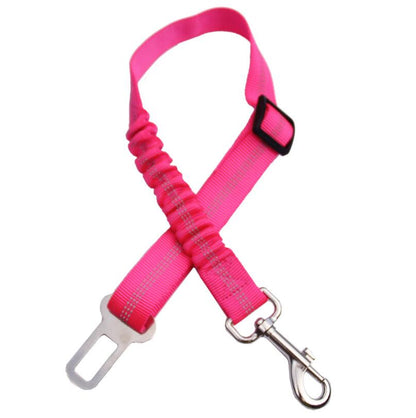 Pink adjustable reflective dog car seat belt with metal hook and locking buckle.