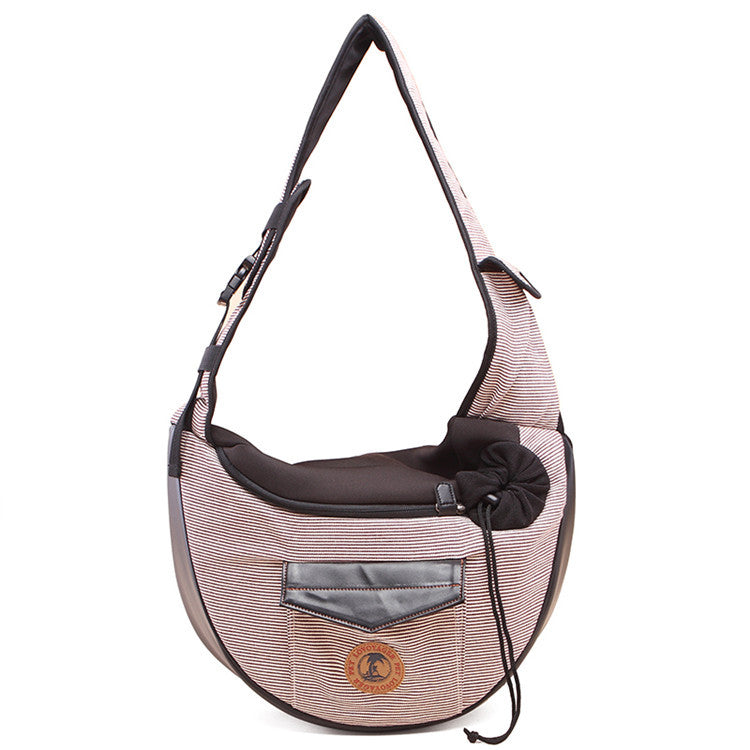 Pink striped pet travel bag with black trim, front pocket and adjustable strap