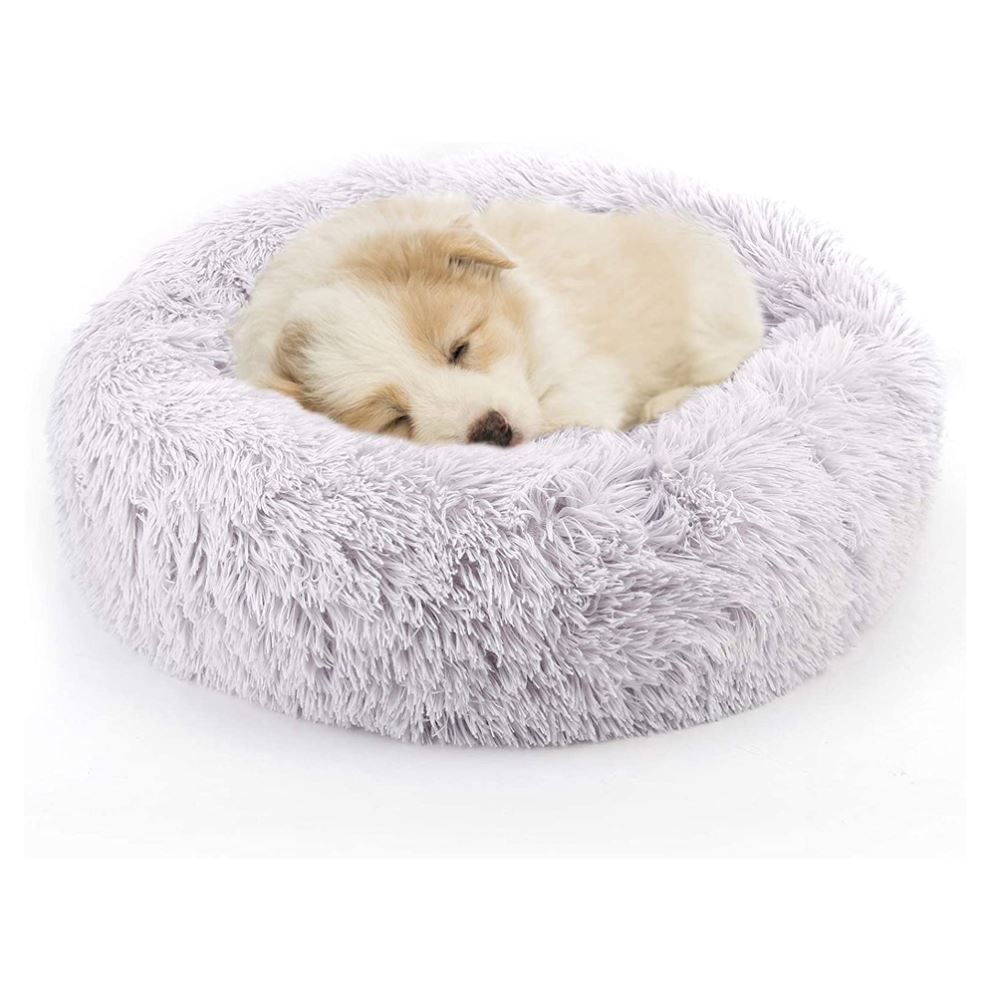 White round plush pet bed with shag fabric and curled rim