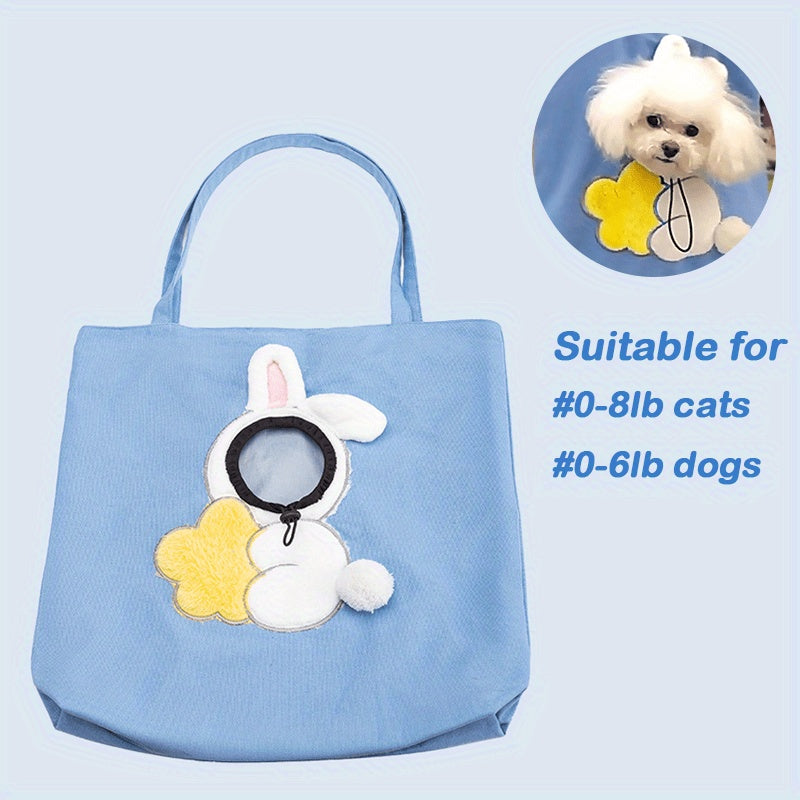 Blue pet carrier tote bag with plush animal face applique and round elastic opening