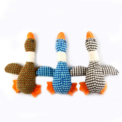 Three plush dog molar cleaning chew toys: olive, blue, and black-and-white