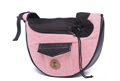 Pink Pet travel bag: striped body with black padded top, drawstring closure, logo badge