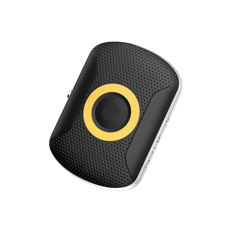 Schwarzer GPS-Tracker mit gelbem Ring, Seitenansicht mit Anschlüssen