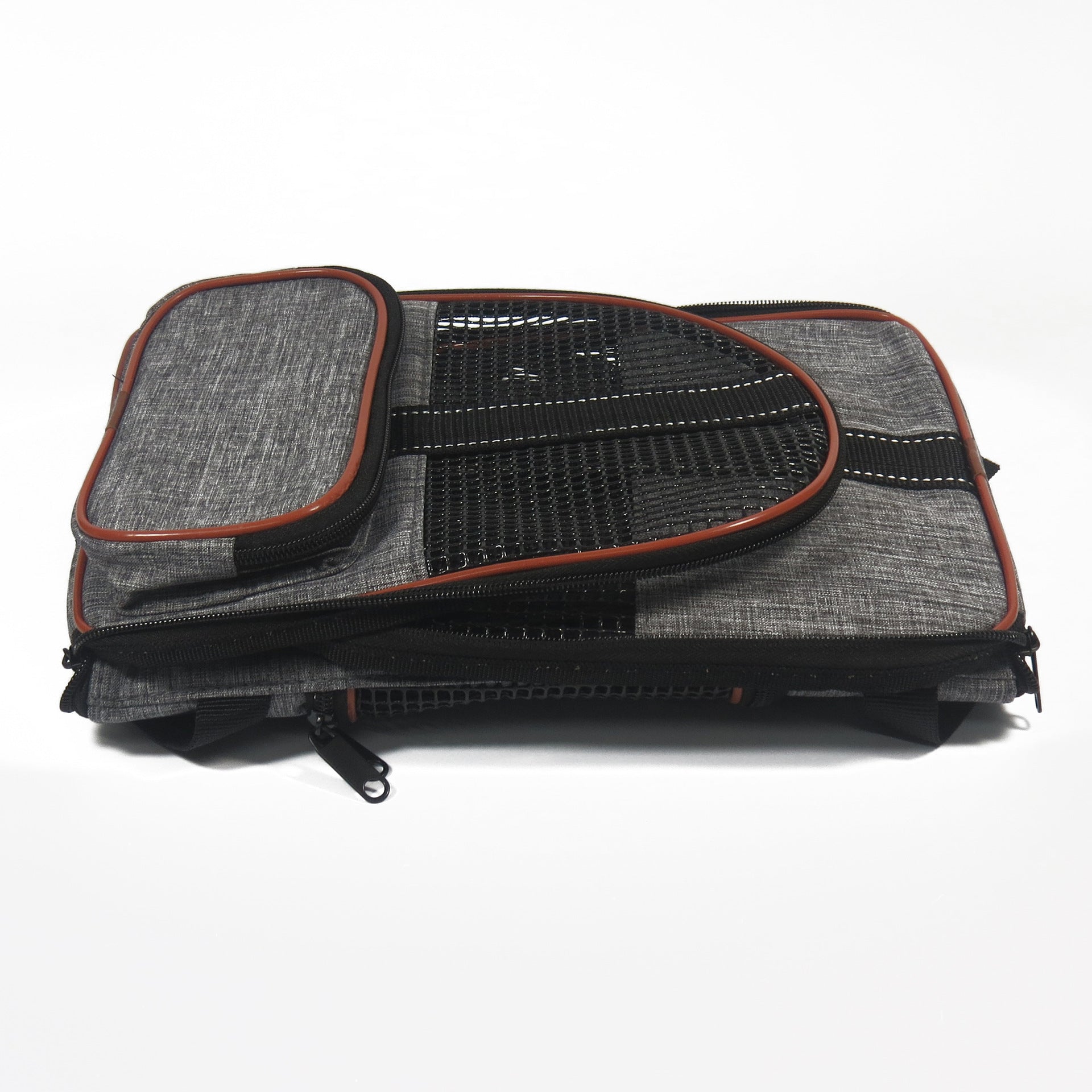 Grey pet carrier travel bag with mesh top window and brown/orange piping, zip closure