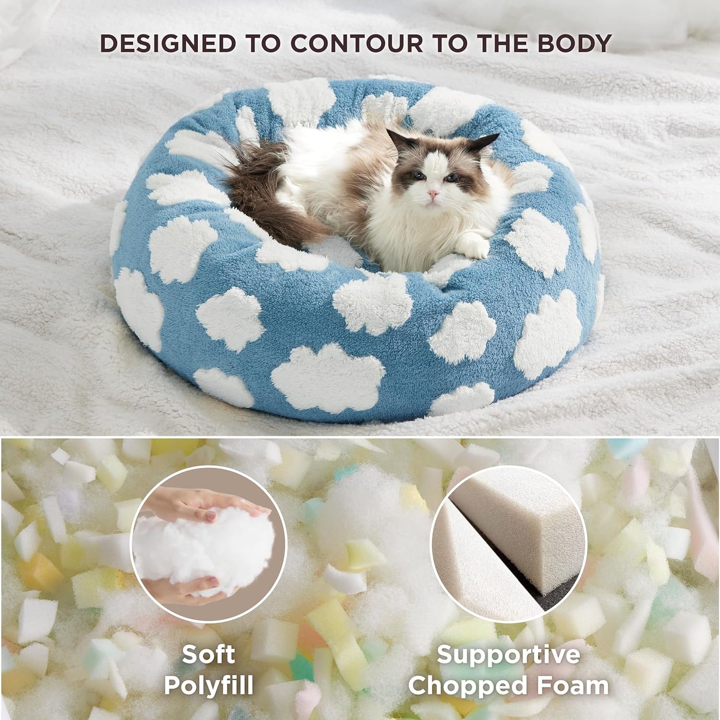 Blue round cat bed with white cloud pattern, contoured plush sleeping nook