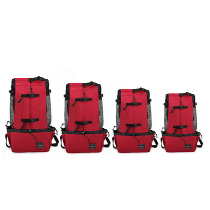 Red dog carrier backpack with adjustable buckles, front mesh window, and base pouch