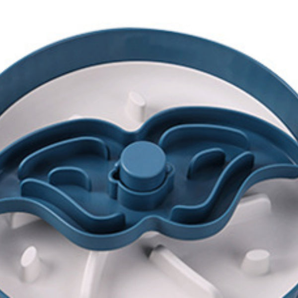 Close-up of blue rotating feeder insert with central spinner