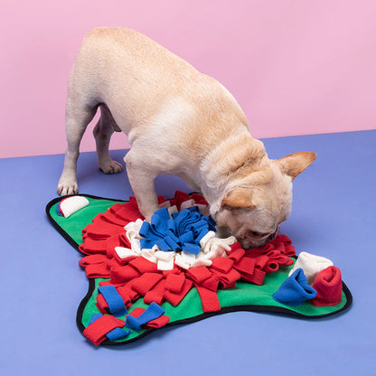 Foraging sniffing pad with dog sniffing; green, red, blue and white fleece strips