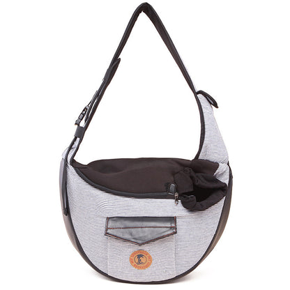 Grey striped pet travel bag with black trim, front pocket and logo badge