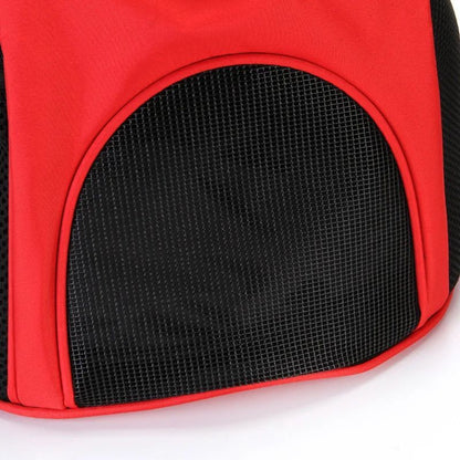 Red puppy carrier backpack close-up of breathable front mesh panel with trim