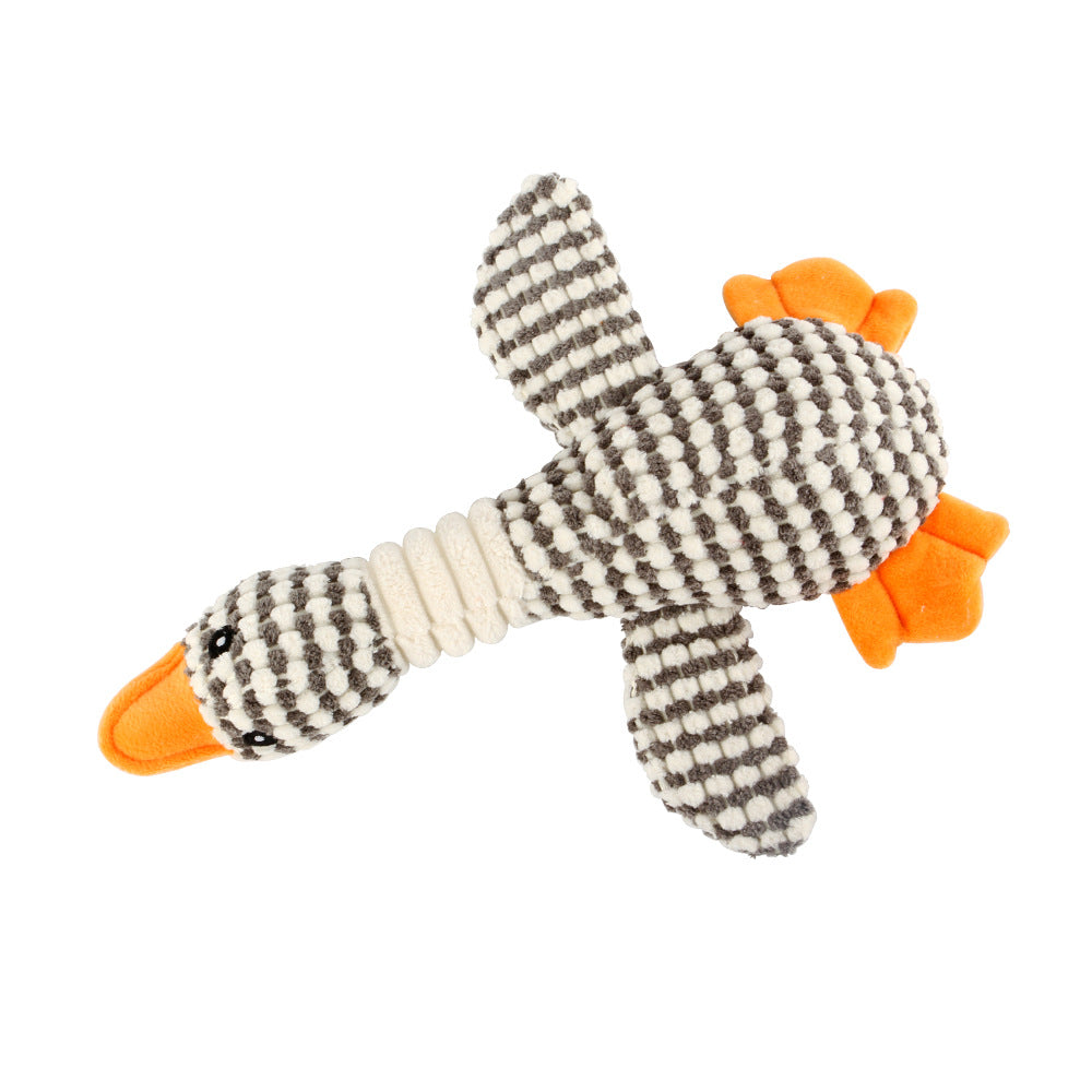 White-and-brown striped plush dog molar toy with orange paw tips and rope.
