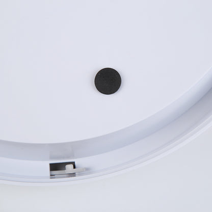 White feeder lid underside with central black sensor port