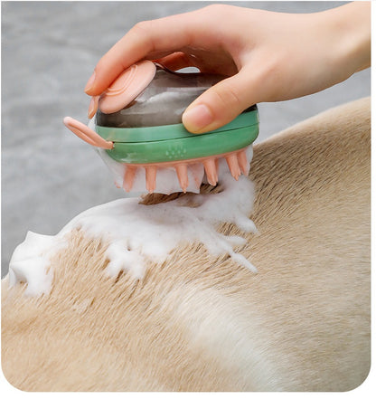 Green pet grooming brush dispensing shampoo onto fur with massage nubs