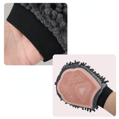 Black elastic wrist band with pink silicone bristle pad on gray grooming glove