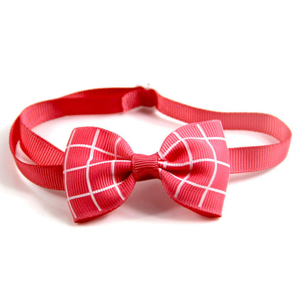 Red elastic neck strap with red-and-white plaid bow tie