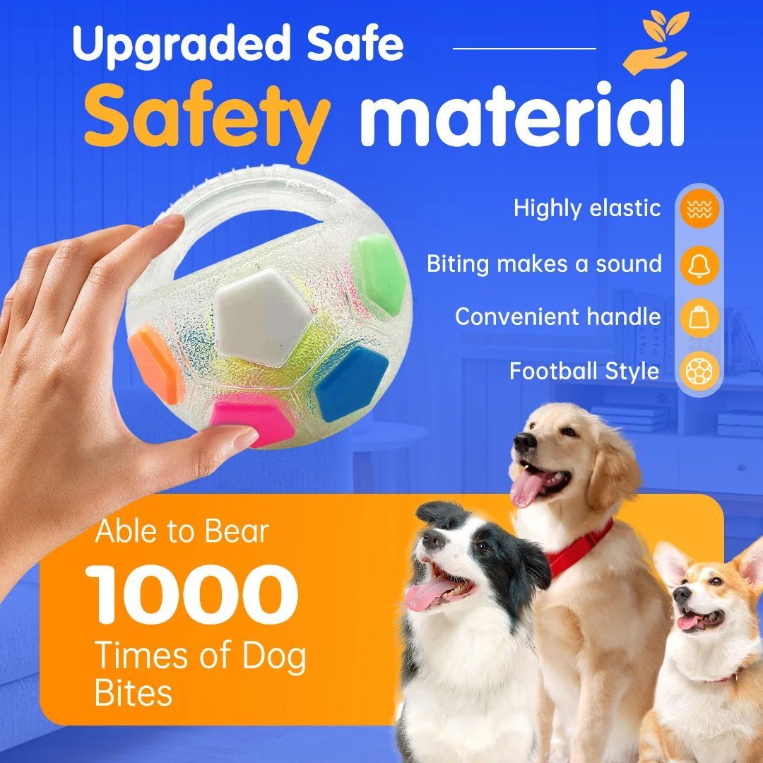 White football-shaped dog toy with multicolor hex panels and finger-grip handle