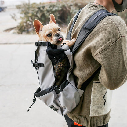 Dark grey dog backpack carrier with mesh front window and adjustable shoulder straps