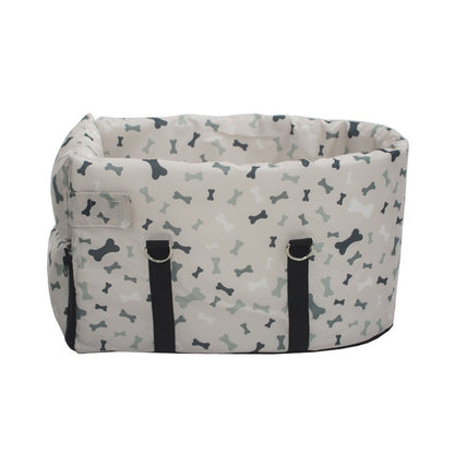 Car pet bed with bone print, black strap handles, buckled front panel