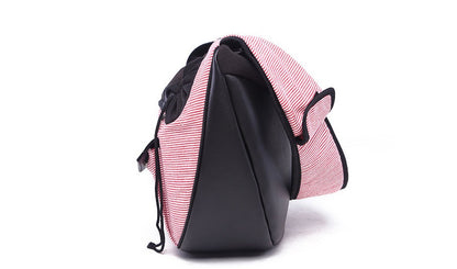 Pink Pet travel bag: side view with black back panel, straps and striped body