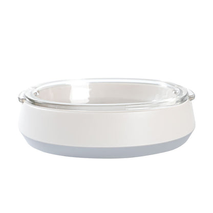 Pet feeding waterer with clear bowl on white base and grey accent ring