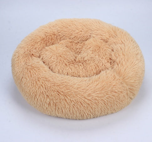Beige round plush pet bed with fluffy raised edge