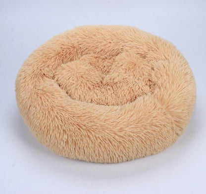 Beige round plush pet bed with fluffy raised edge