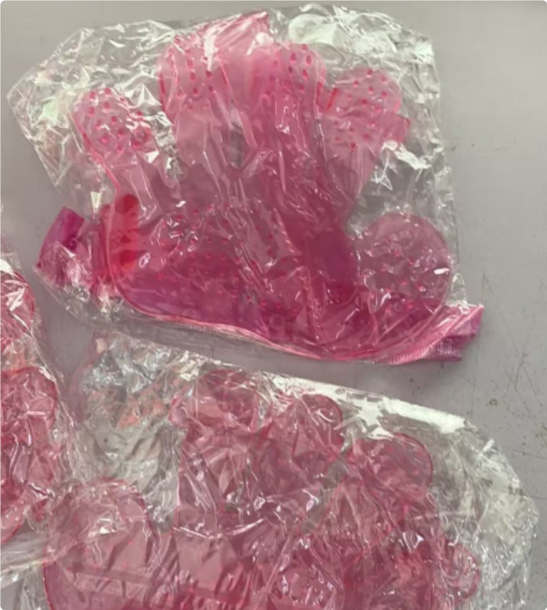 Pink finger grooming brush, rubber massage bumps on hand-shaped glove