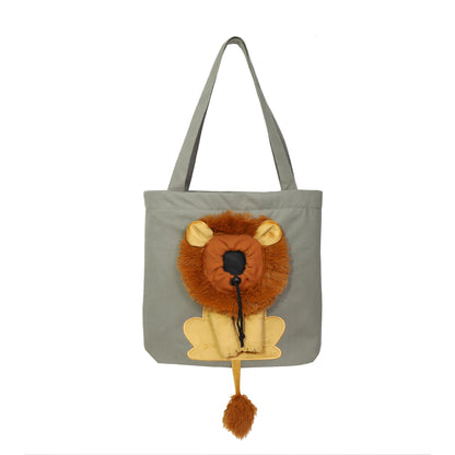 Dark grey pet carrier tote with lion face plush and hanging pom-pom tassel
