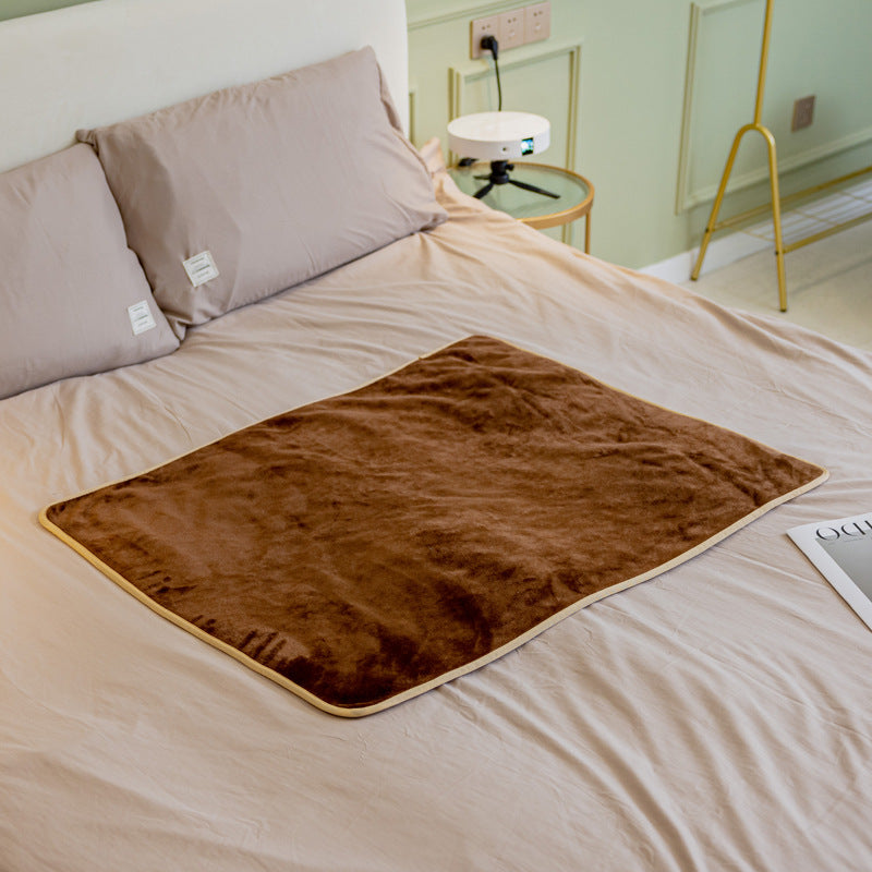 Coffee fluffy waterproof pet blanket with gold edge trim, laid flat