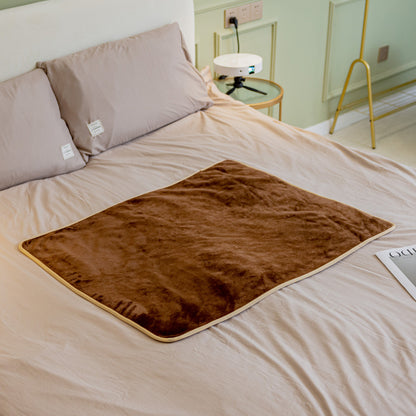 Coffee fluffy waterproof pet blanket with gold edge trim, laid flat