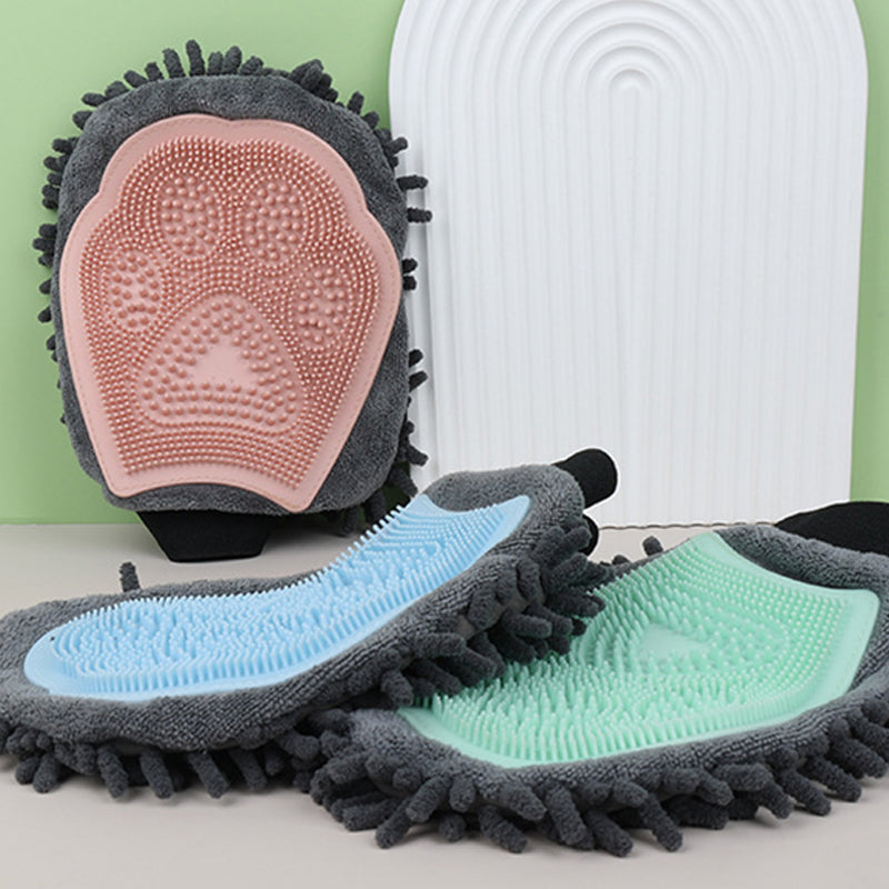 Double-sided pet brush glove with blue and mint silicone pads on gray chenille
