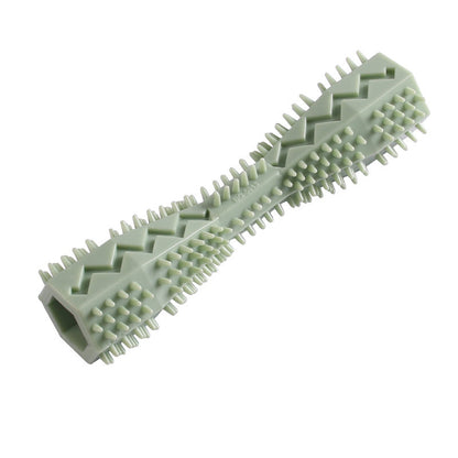 Green ridged dog chew toy with textured bristle nubs and inner opening