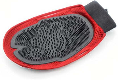 Red pet grooming mitt with gray oval nub pad and black wrist strap