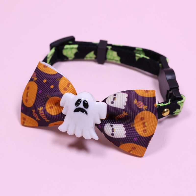 Small pet collar with safety buckle, orange pumpkin bow and white ghost charm