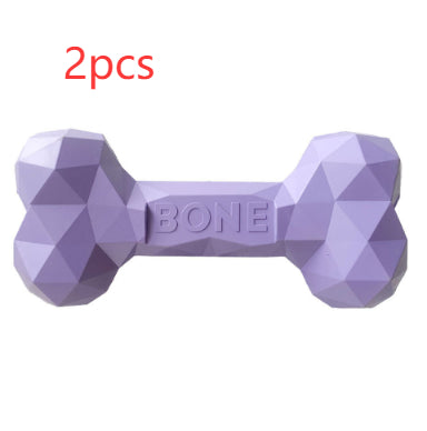 Lavender rubber bone dog toy with raised BONE text, bite-resistant