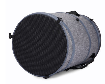 Grey foldable pet carrier tunnel with textured black end panel and mesh side seam