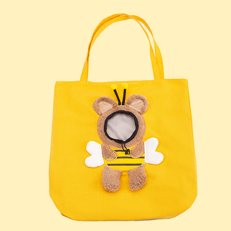 Yellow pet carrier tote bag with plush animal face applique and ear detail