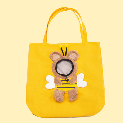 Yellow pet carrier tote bag with plush animal face applique and ear detail