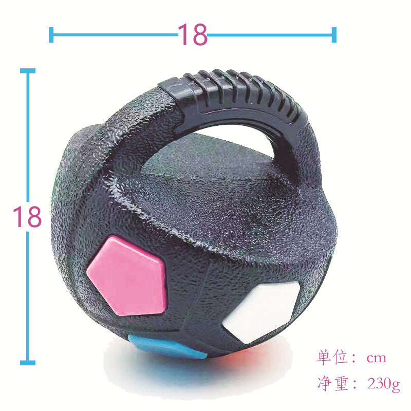 Black football-shaped dog toy handle style with pink, blue and white hex details