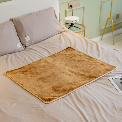 Camel fluffy waterproof pet blanket with beige trim edge, laid flat