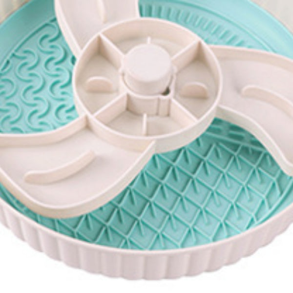 Rotating pet food basin with anti-choke silica pad, teal base and white compartments